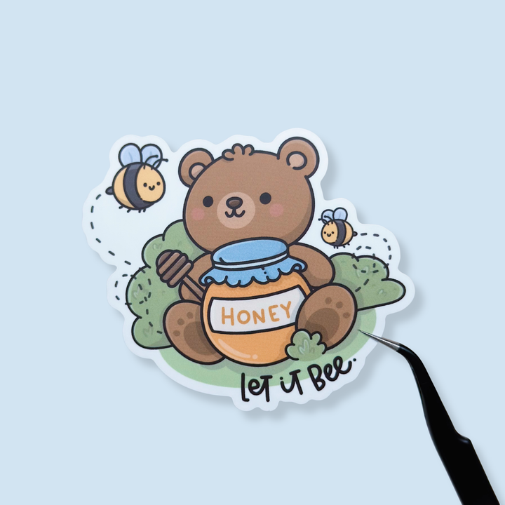 Sticker of a bear holding a honey jar with bees on a light blue background
