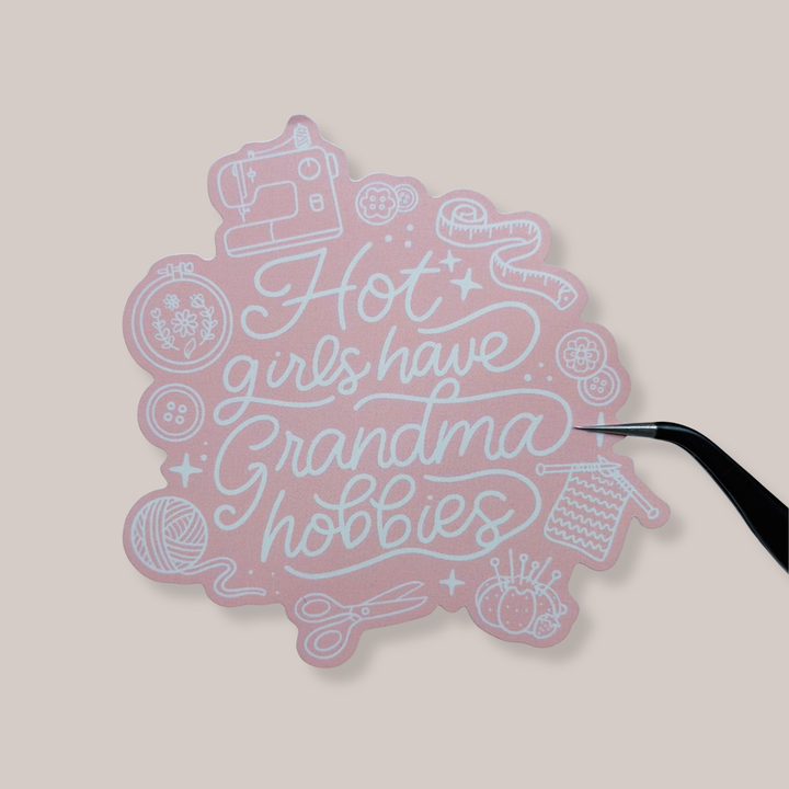 Pink sticker with text &