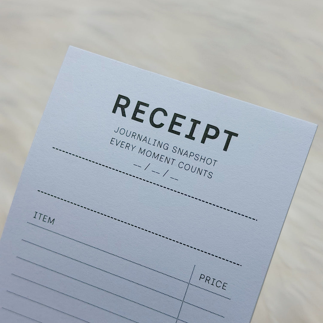 Receipt journaling sheet with text and columns on a light background