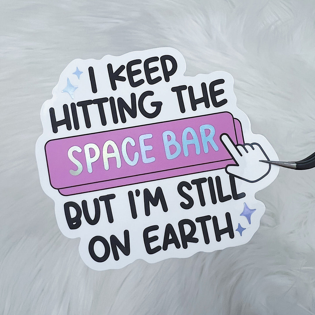 I Keep Hitting The Space Bar But I'm Still On Earth Vinyl Sticker Die Cut | Holographic Foiled