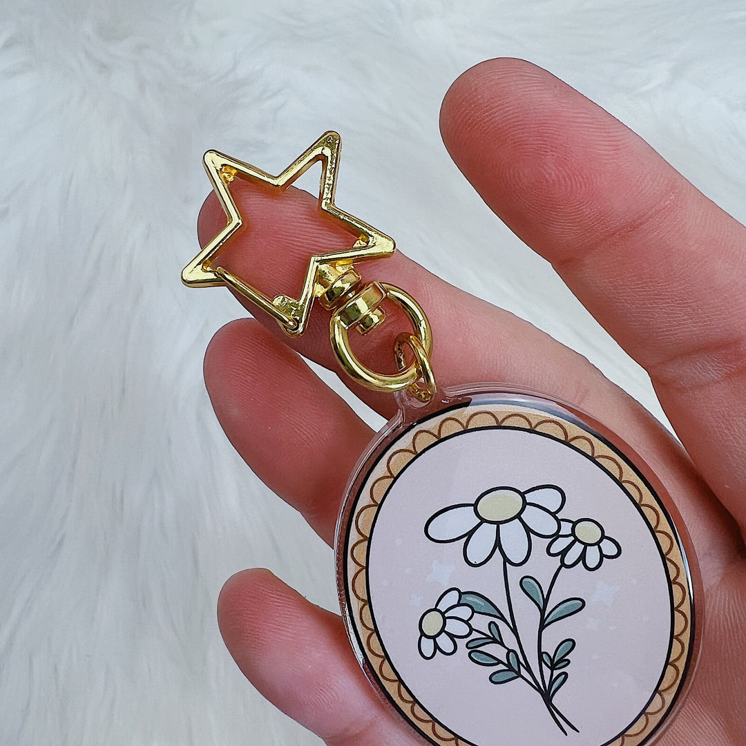 Llavero acrílico floral esqueleto