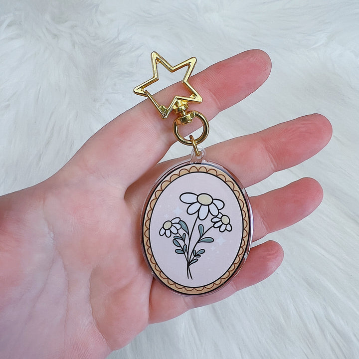 Llavero acrílico floral esqueleto