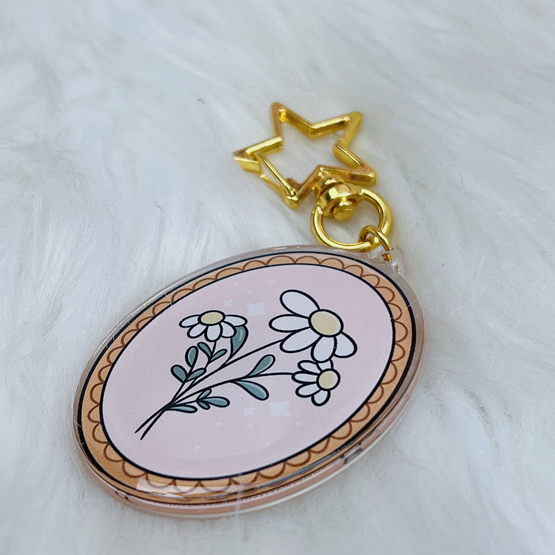 Llavero acrílico floral esqueleto