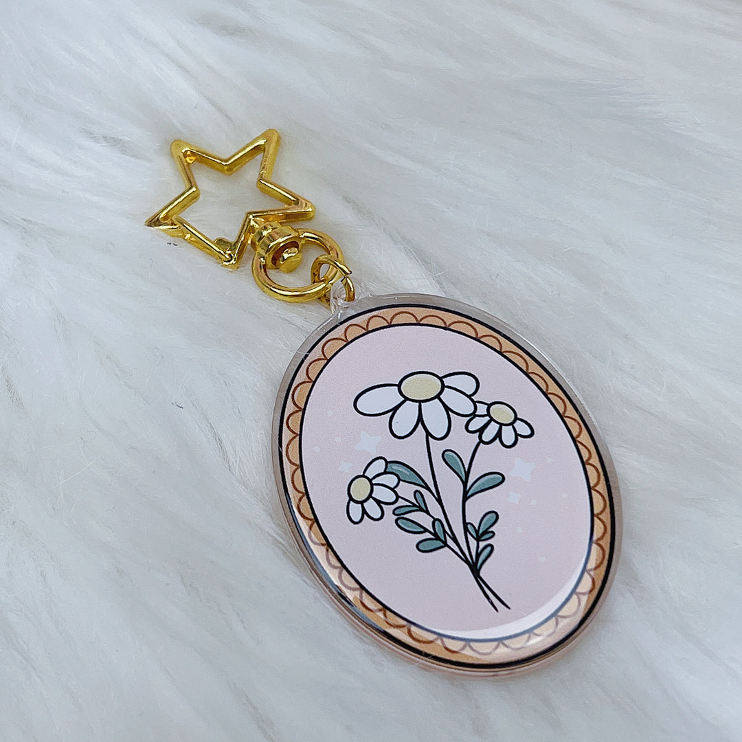 Llavero acrílico floral esqueleto