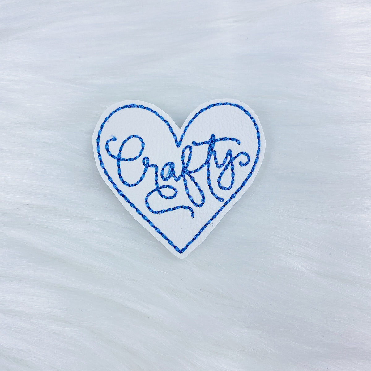 Astuto con fieltro de costura azul