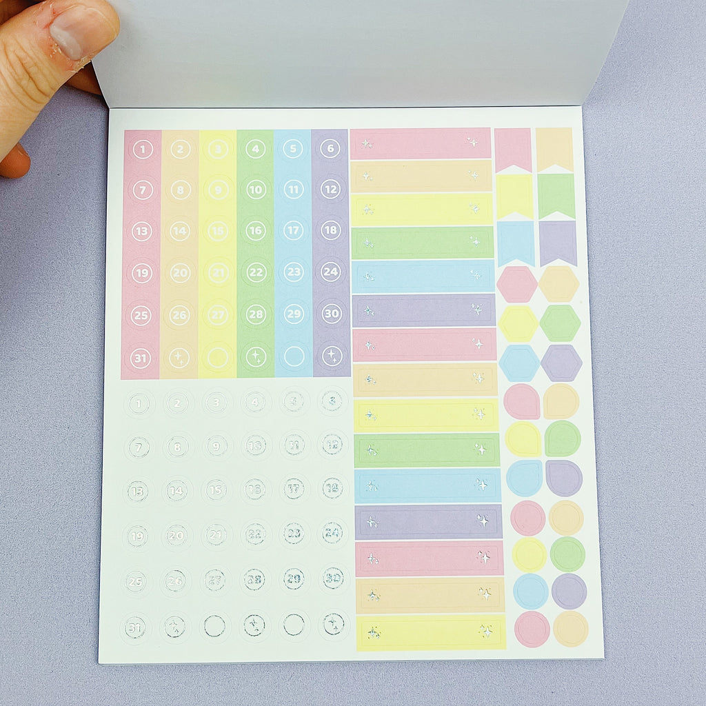 Libro de pegatinas de lujo funcional en colores pastel | Papel adhesivo mate | 15 páginas | Pixie Holo frustrado