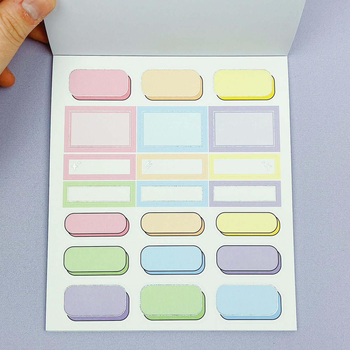 Libro de pegatinas de lujo funcional en colores pastel | Papel adhesivo mate | 15 páginas | Pixie Holo frustrado