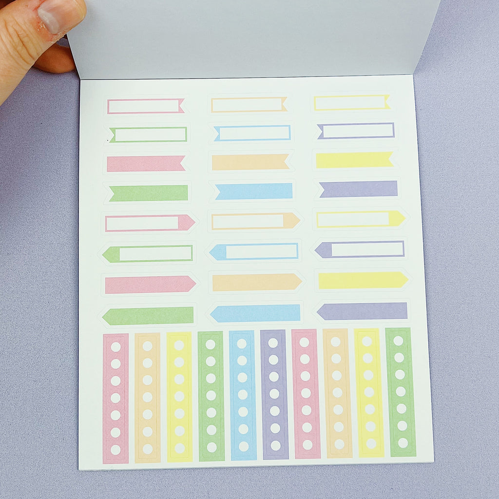 Libro de pegatinas de lujo funcional en colores pastel | Papel adhesivo mate | 15 páginas | Pixie Holo frustrado