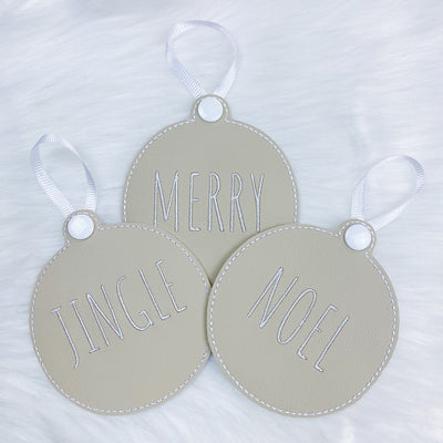 Merry, Noel, + Jingle Taupe Vegan Leather Embroidered Ornaments | Set of 3